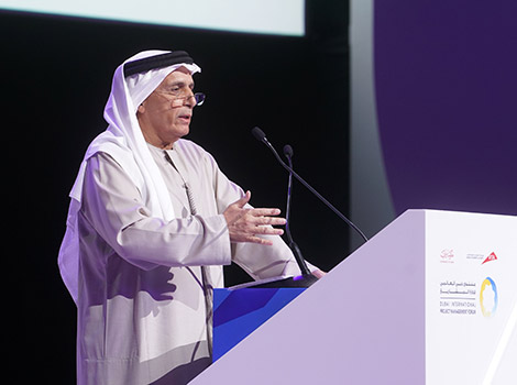 an image of Al Tayer delivering his keynote speech at the forum